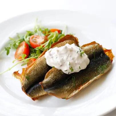 Smoked herring patties served with radish crème fraiche